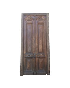 Puerta de frente de madera cedro con rejas